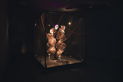 Liliane Lijn, Electric Bride, 1989, Installation, aluminium, steel, cock feathers, Elmflex micanite, brass, blown glass